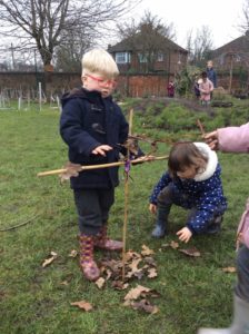 others focused their attention on creating a scarecrow to keep the birds away from our mud mountains.